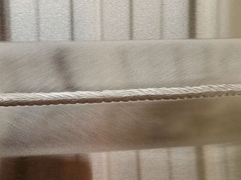 Fish scale pattern welding process