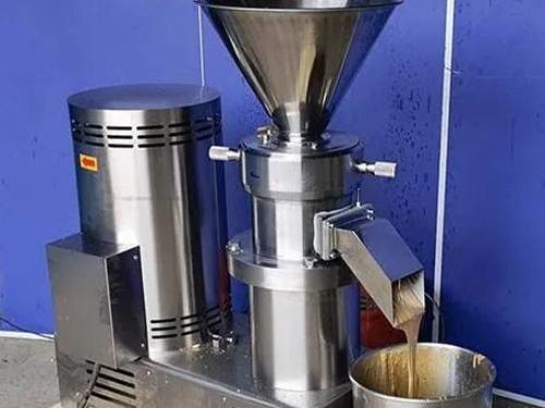Commercial colloid mills used in food processing plants for testing and grinding peanut butter