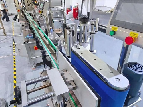 The use of vertical round bottle adhesive labeling machine in production line