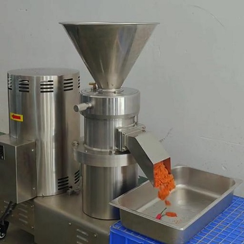  Colloid mill grinding fresh chili into smooth red chili paste