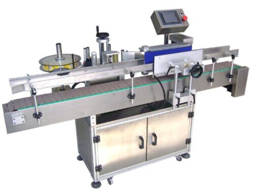 Automatic round bottle labeling machine applying a wrap around label to a cylindrical bottle on a conveyor