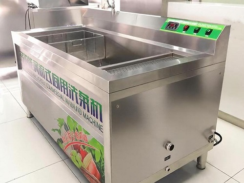 Side view of a stainless steel vortex bubble fruit and vegetable washer with control panel